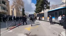 Orthodox Jews clash with police and block roads in Jerusalem