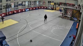 Basketball explodes when player goes to pick it up on court