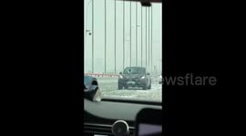 Falling ice pillars damage vehicles on bridge as temperatures rise in southern China