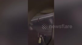 Passenger arrested for opening PLANE DOOR as it takes off in Thailand (extra video)
