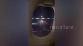 Passenger arrested for opening PLANE DOOR as it takes off in Thailand