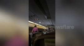 Shocking moment Canadian tourist opens PLANE DOOR during take off