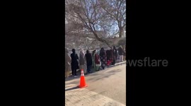 Residents form long queues to vote in general election after blasts left 26 dead the day before