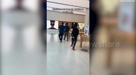 Brazen thief steals over 40 iPhones from Apple store as police car is parked outside