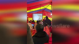 Bride and groom trapped by sudden snowstorm attend their wedding via video call