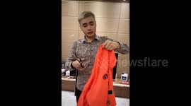 Furious Chinese football fan RIPS signed Lionel Messi jersey after his absence from Hong Kong match