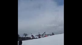 Moose on the loose barrels down Wyoming resort slopes, weaving in and out of skiers