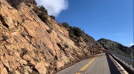 Massive boulder narrowly misses crew during landslide in California