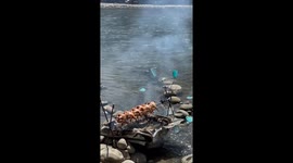 Clever camper uses water wheel to grill chicken