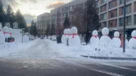 Bizarre video shows over 100 giant snowmen taking over a Chinese neighbourhood
