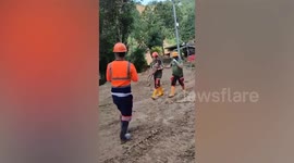 Child landslide survivor, 3, rescued after three days buried alive in the Philippines