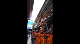 A group of Chinese boys perform a human tower in central Bangkok on the eve of Chinese New Year which falls on February 10th, 2024