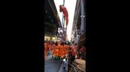 A group of Chinese boys perform on Silom Road in central Bangkok on the eve of Chinese New Year which falls on February 10th, 2024