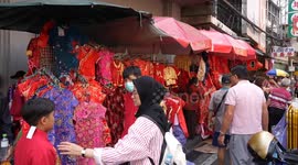 Locals flock to shops and temples for Chinese New Year in Thailand