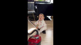 Cute Kiddo Loves Riding on the Vacuum
