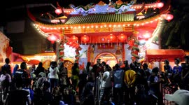 Chinese People Pray on the Eve of Chinese New Year Celebrations,