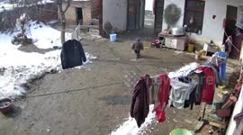 Snow avalanche falls from roof just inches from toddler