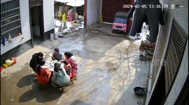 Snow topples from roof right onto family having lunch in yard