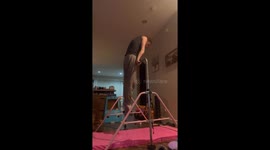 Gymnastic coach's daring 'Double Back-Hip-Circle' attempt opens the door to embarrassment