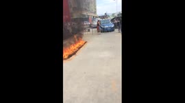 Man walks through fire, barefoot