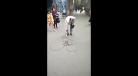 Artist uses bottle of water to draw perfect image of China's Monkey King legend