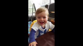 Toddler learns how to blow raspberry
