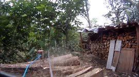 Chainsaw cam (GoPro) - cutting up a stack of logs with a Husqvarna 570