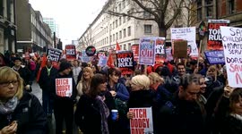 Thousands march to demand UK PM resignation