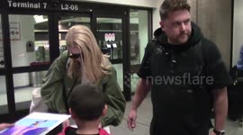 Singer Iggy Azalea fuels further speculation about her relationship with  Nick Young as she is spotted without her engagement ring at LAX Airport
