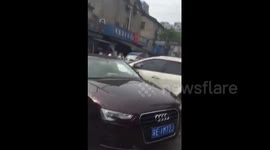 Sports Utility Vehicle crashes Audi