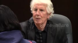 Music Legend Graham Nash of the rock band Crosby, Stills and Nash signs copies of his new CD
