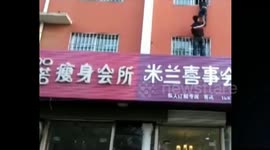 Man rescues a boy with head stuck in second-floor window