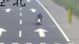 Man drags police officer on motorbike for around 100 metres