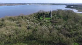 Beautiful drone flight over Church Island at Lough Beg, Northern Ireland