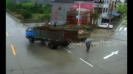 Lucky man escapes being knocked over by lorry