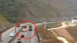 Tyre flies out of trailer on motorway leading car crash