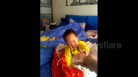 Baby stops crying when he gets money