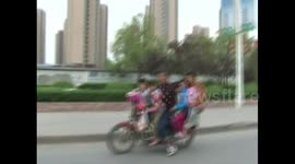 Six people travel on overloaded motorbike