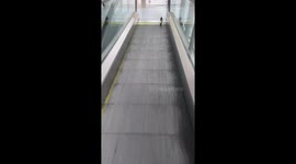 Shoe Stuck In The Moving Sidewalk