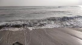 This video is from the sea shore of Dhanushkoti in Tamil Nadu state of South India. Which is the last end of India. Here the waves are shown surging in the moderate light of the setting sun.