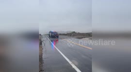Flood washes away road in Kern County, California