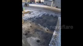 Smart car lift: unique driveway parking maneuver in Fort McMurray