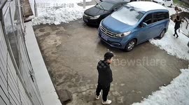 Man's swift reaction saves him from being buried under melting snow