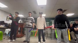 Students create mesmerizing music with plastic sticks