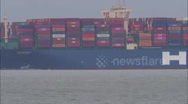 HMM Helsinki giant 400-metre container ship arrives on River Thames, UK