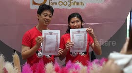 Hundreds of couples married on Valentine's Day in Thailand