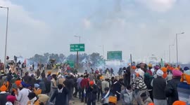 Security forces fire tear gas at protesting farmers second day on drive to Delhi