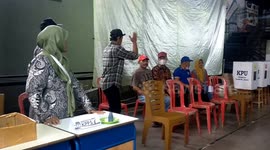 Indonesian citizens cast their votes in the 2024 presidential election in Jakarta, Indonesia