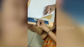 Customs officials seize gold hidden in cardboard sheet at airport in western India