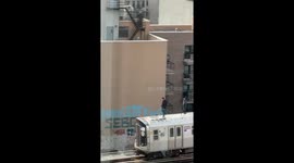 Real-life Subway Surfers! Teenagers spotted standing atop of moving train in NYC